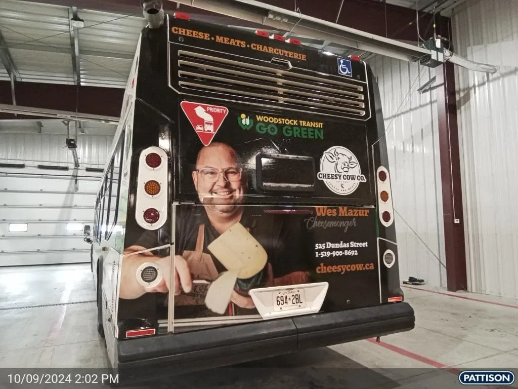 Cheesy Cow: transit bus wrap, designed by Creative Atmosphere