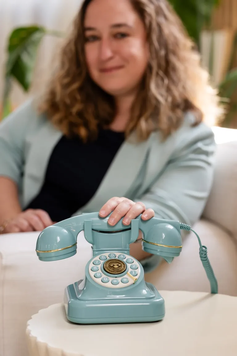 Kristen Jerry with a vintage telephone