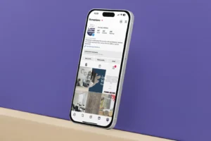 Mockup of an iPhone 15 pro max leaning against a customizable surface